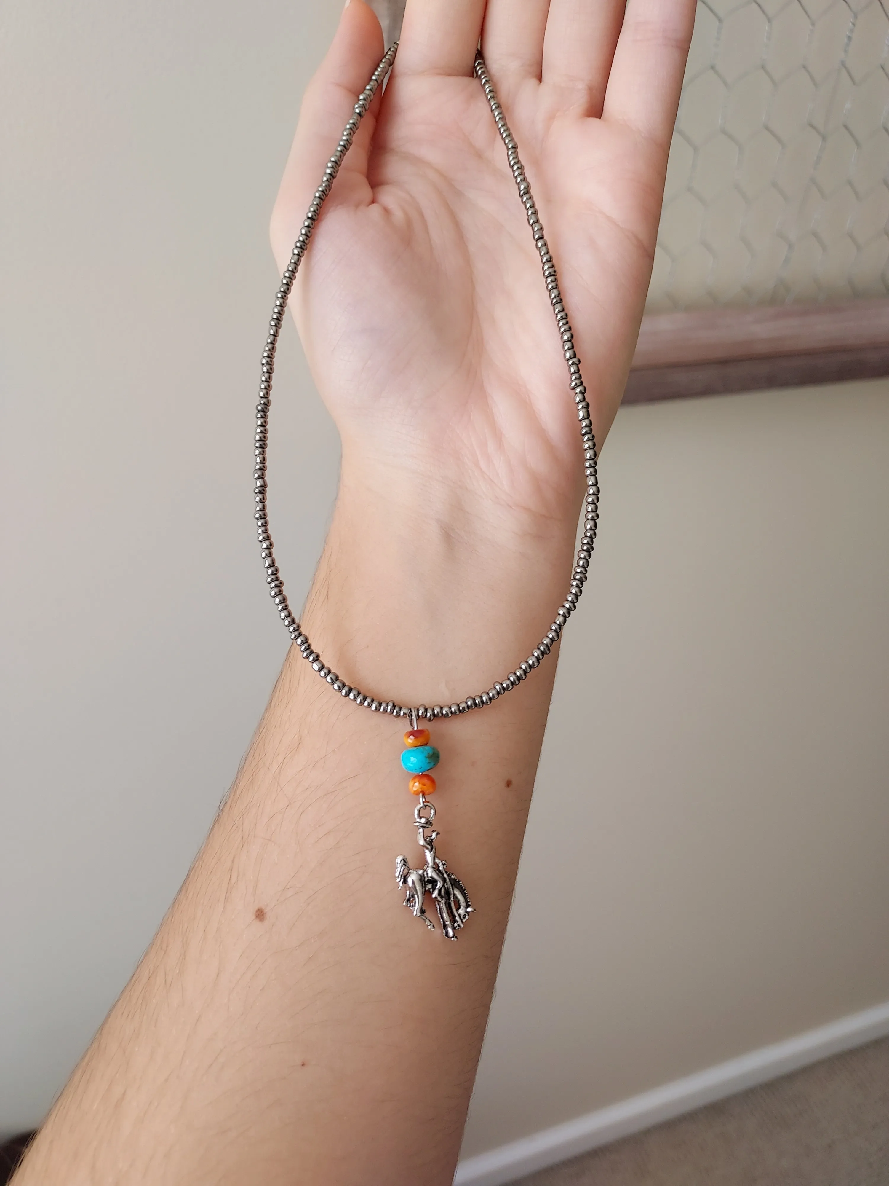 Broncen cowboy necklace