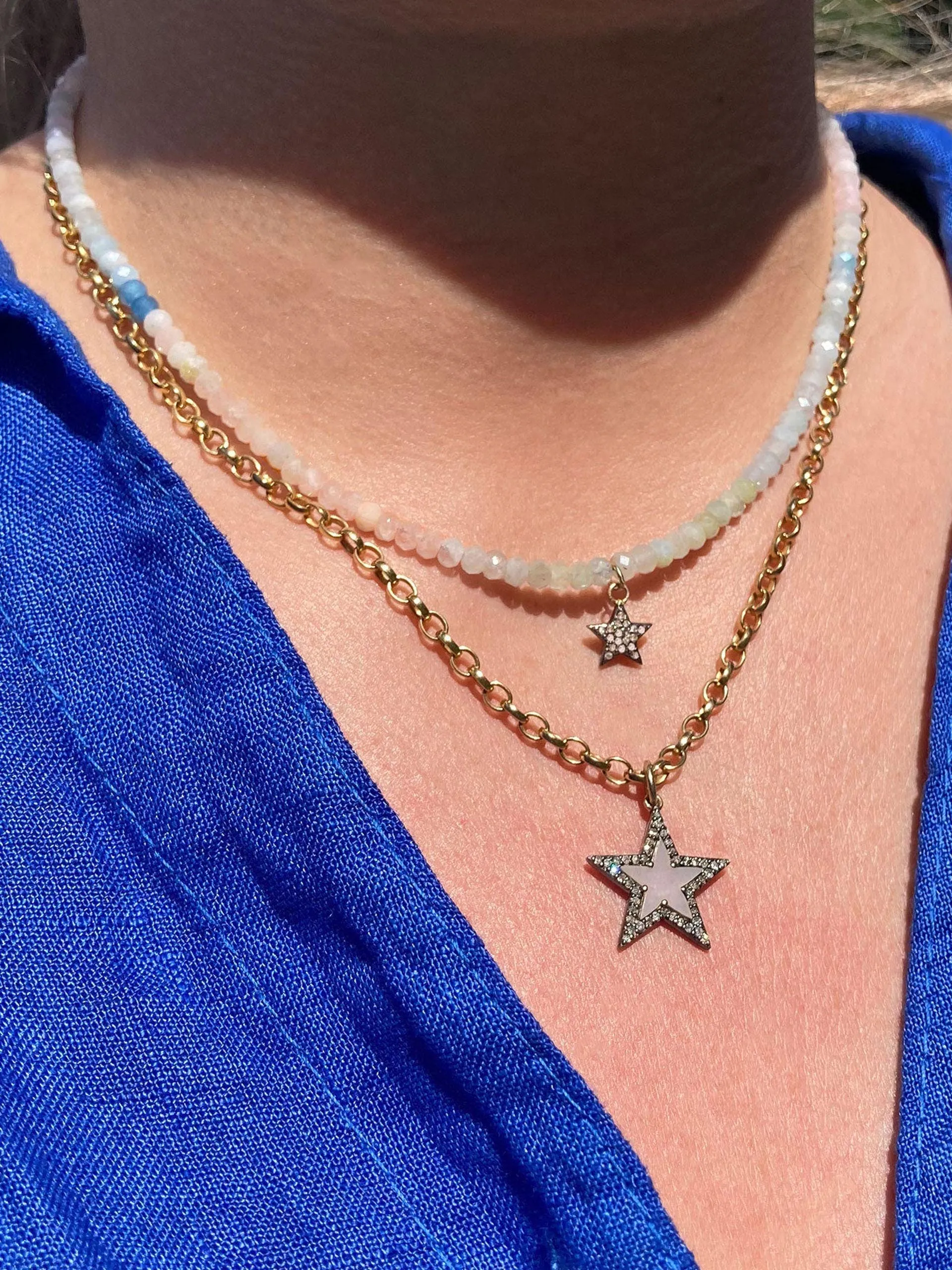 Diamond star and aquamarine bead necklace