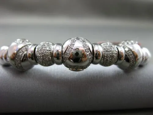 ESTATE 2.05CT DIAMOND 14KT WHITE GOLD CIRCULAR FLEXIBLE FILIGREE BANGLE BRACELET