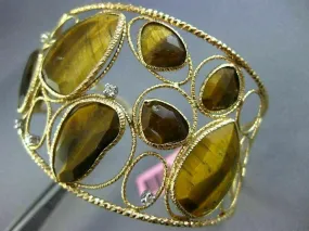 ESTATE LARGE .16CT DIAMOND & AAA TIGER EYE 14KT YELLOW GOLD 3D BANGLE BRACELET