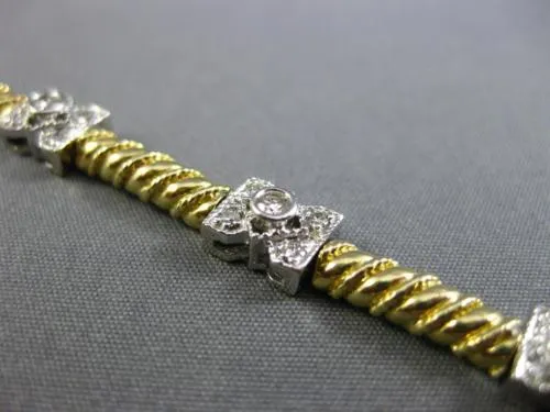 ESTATE WIDE 1.0CT DIAMOND 14KT TWO TONE GOLD FILIGREE BUTTERFLY TENNIS BRACELET