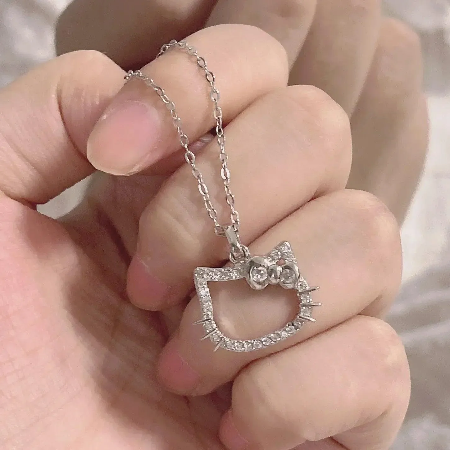 Hello Kitty Zircon Pendant: Sparkling Elegance & Whimsical Charm