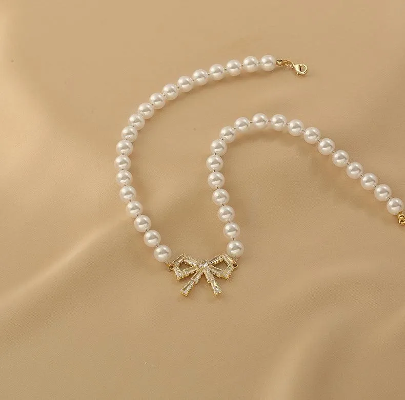 Ladies Lux Fake Pearl Bowknot Necklace SKAJ015
