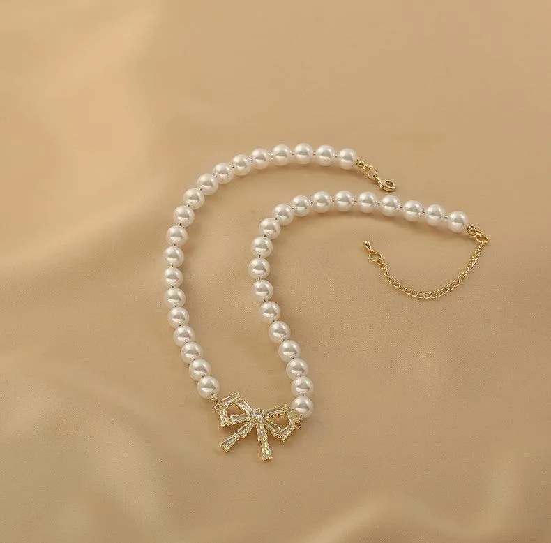 Ladies Lux Fake Pearl Bowknot Necklace SKAJ015