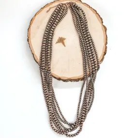 Multi Strand Long Faux Navajo Pearls in Copper Tone