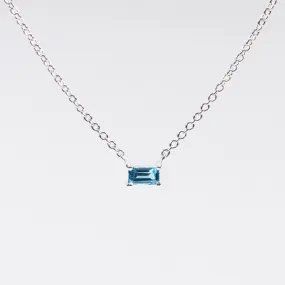 Silver Baguette Solitaire Blue Topaz Necklace
