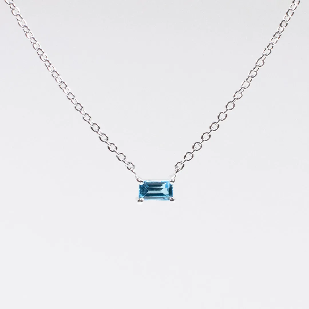 Silver Baguette Solitaire Blue Topaz Necklace