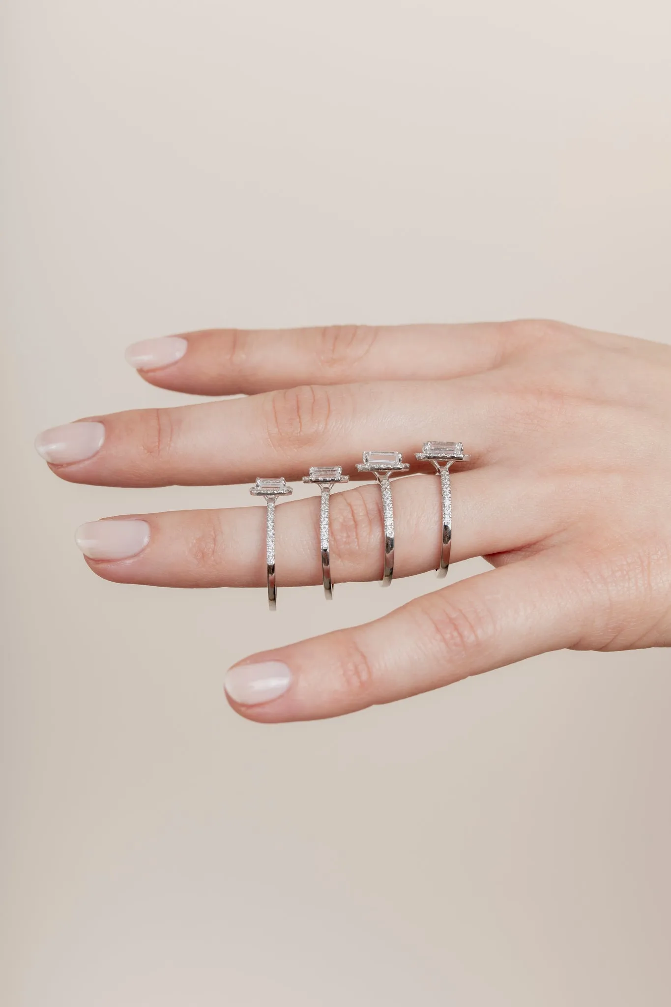 The Emerald Solitaire with Pavé band and Halo