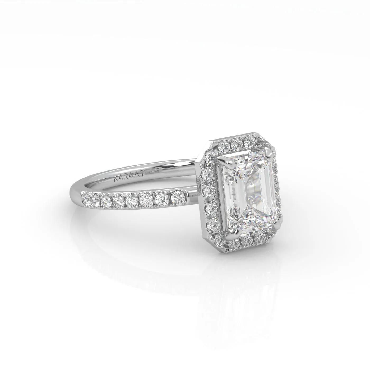The Emerald Solitaire with Pavé band and Halo