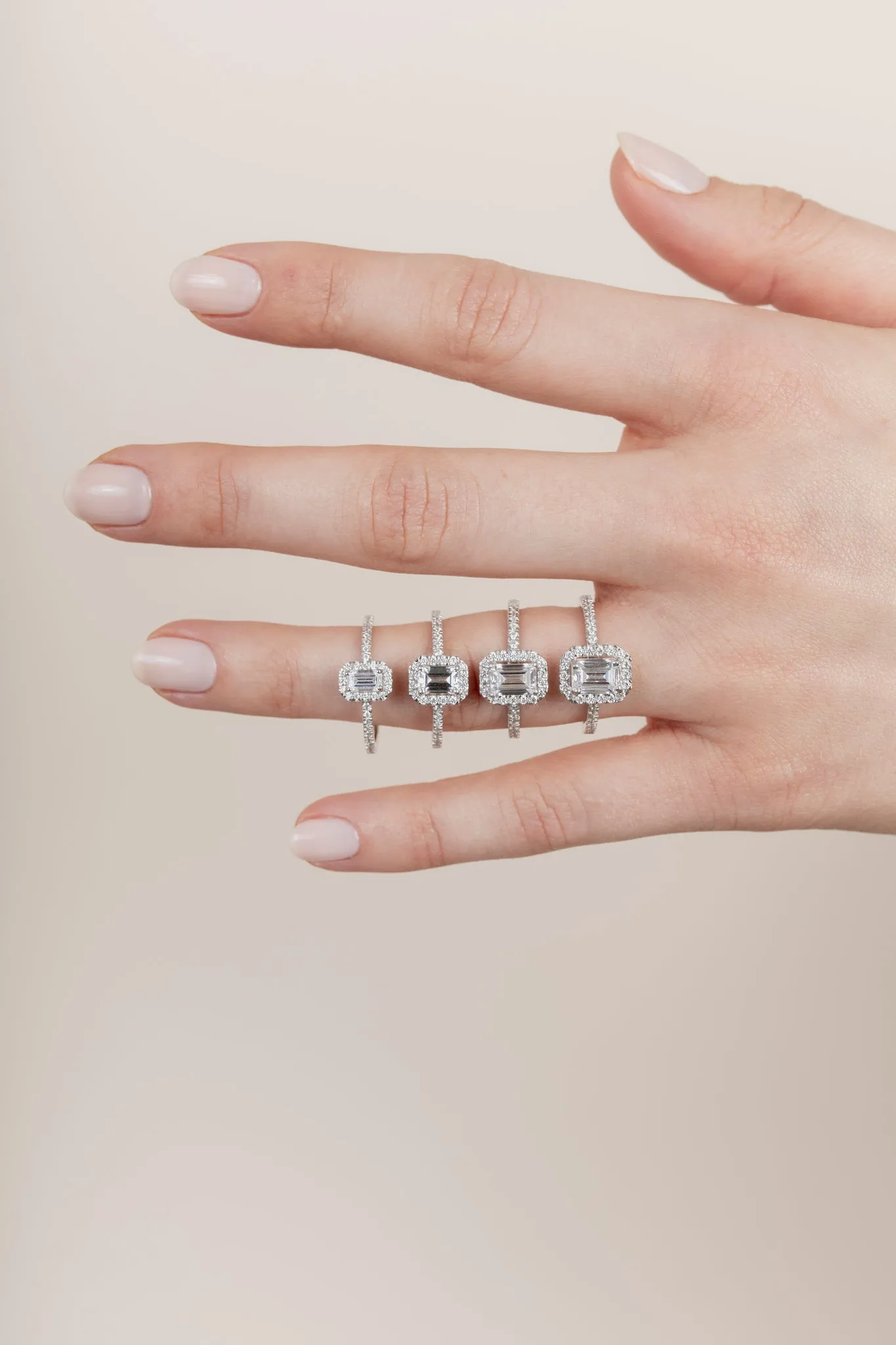 The Emerald Solitaire with Pavé band and Halo