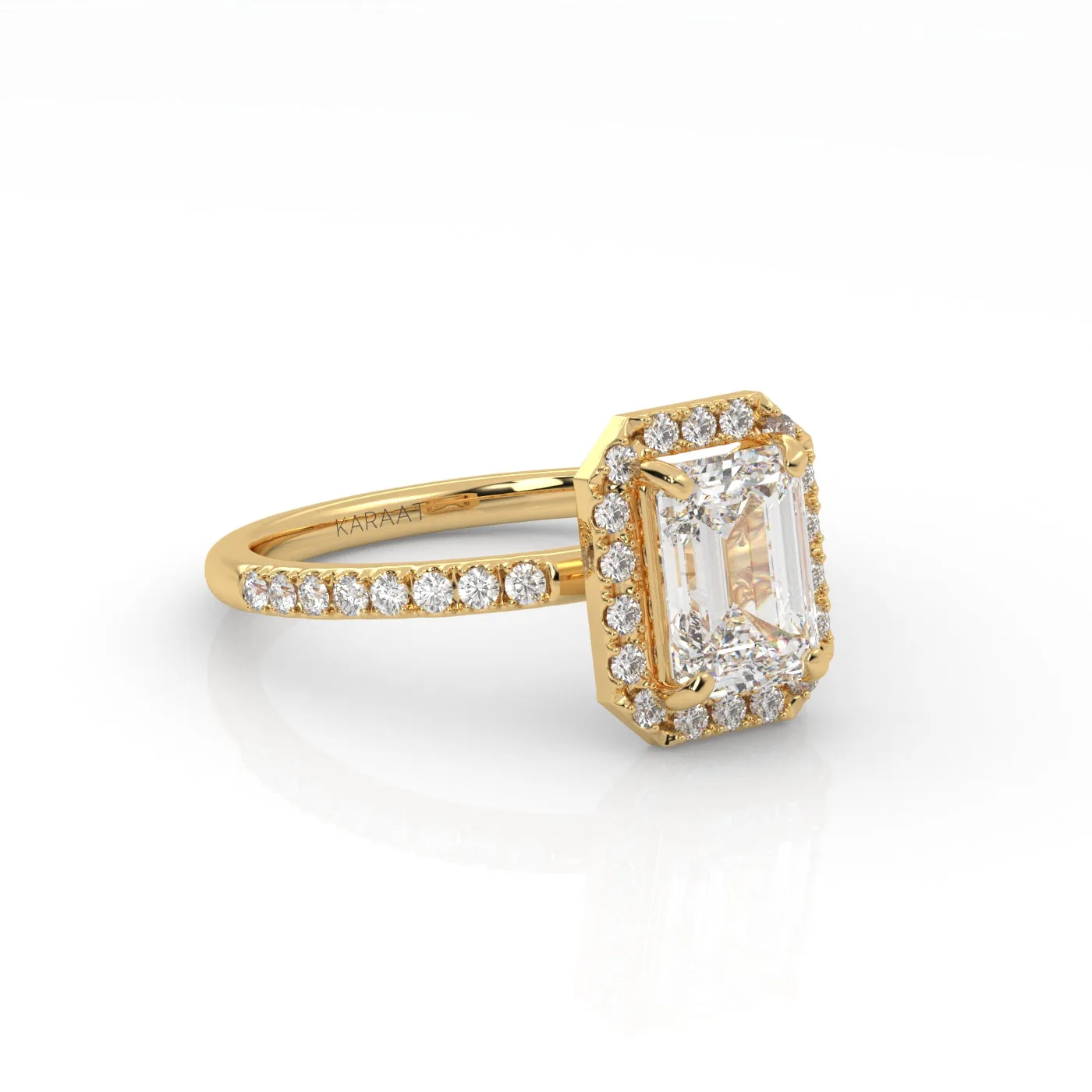 The Emerald Solitaire with Pavé band and Halo